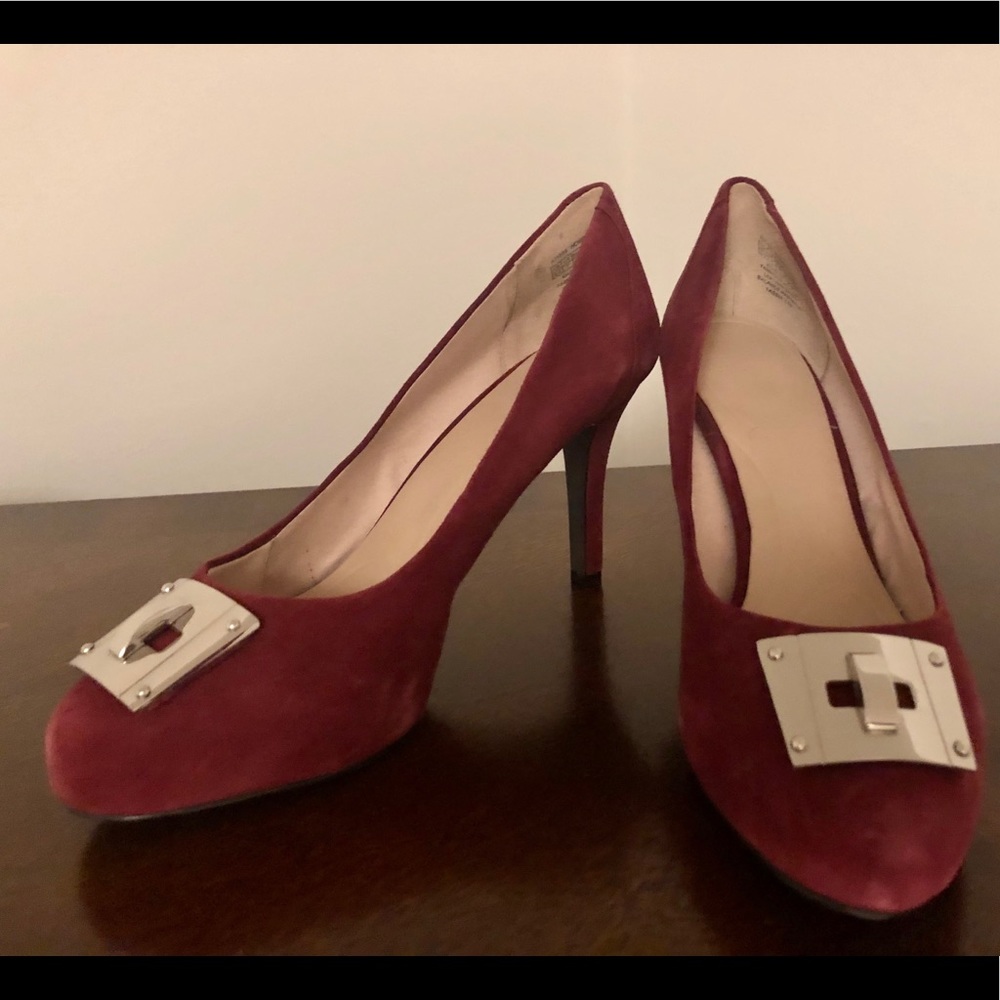 Rockport maroon heel with silver detail, size 9.5